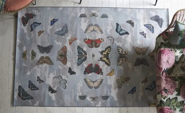 Designers Guild butterfly rug in a styled room