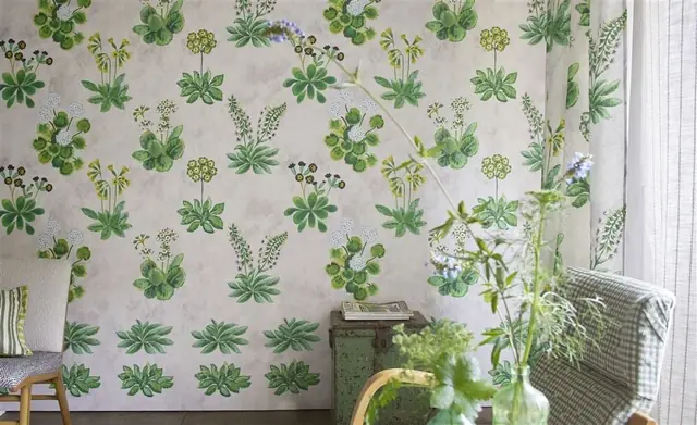 Designers Guild green botanical wallpaper in a contemporary interior