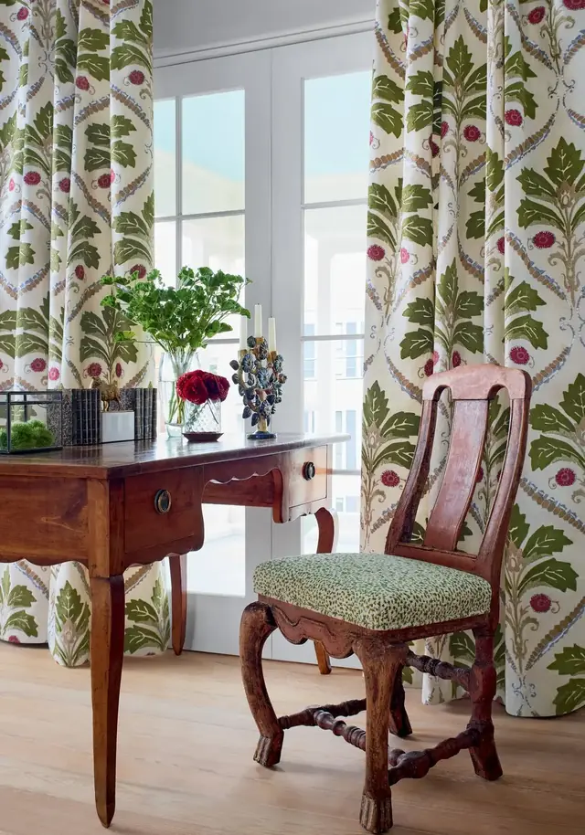 Botanical damask embroidered fabric used for full-length curtains