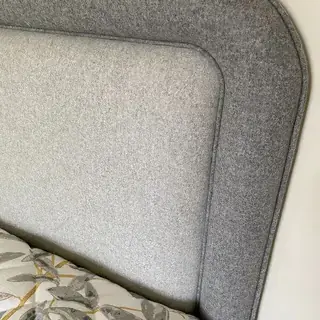Flat upholstered headboard with piped edge