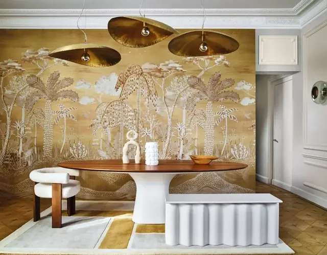 Gold botanical mural wallpaper used in a contemporary dining room