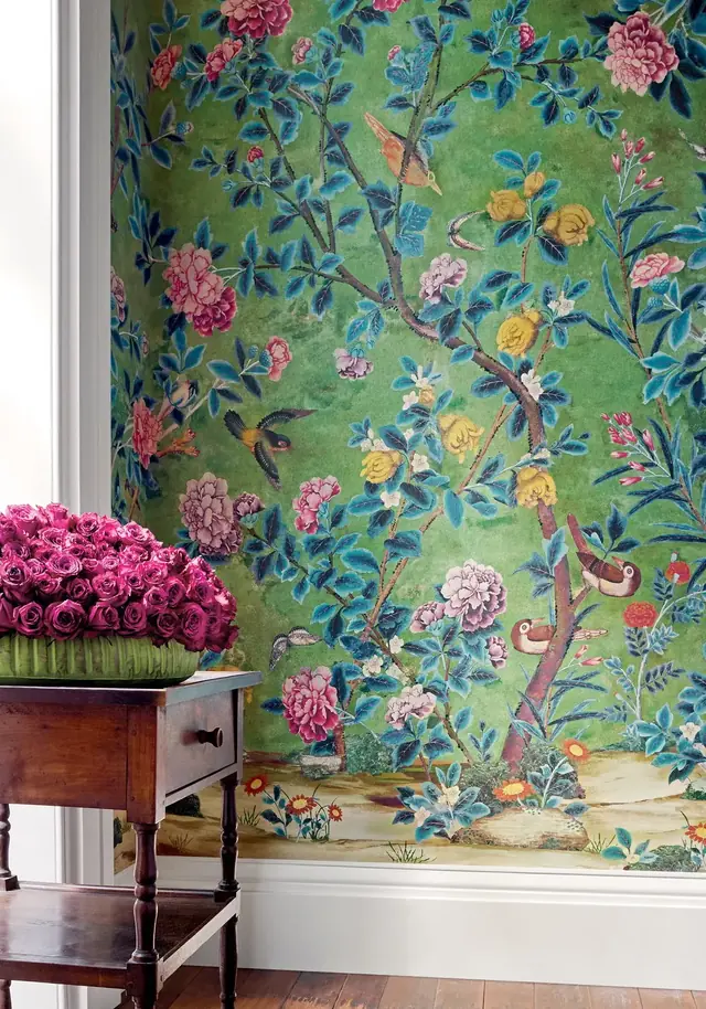 Green floral Jardin Bloom wallpaper with colourful flowers and trailing foliage