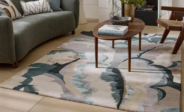 Harlequin rug and upholstery coordinated in a calm contemporary room