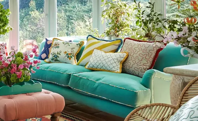 Harlequin patterned and textured cushions in a colourful living room