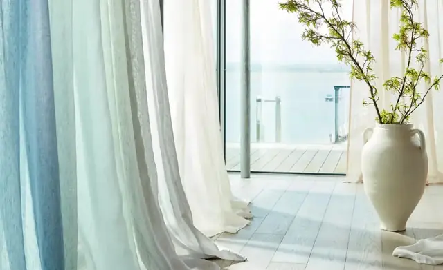 Harlequin sheer curtain fabrics in blue and neutral colourways
