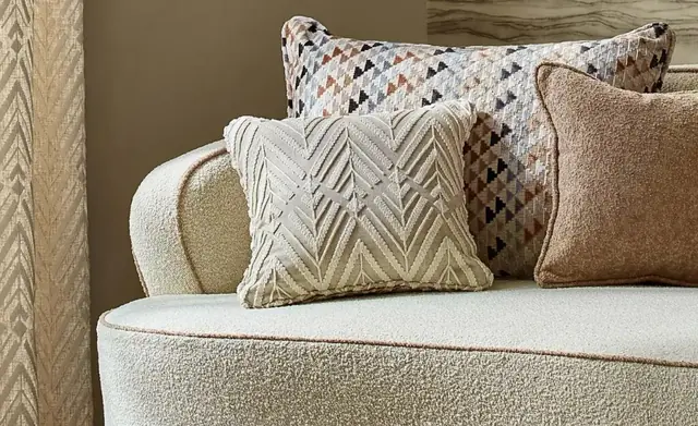 Harlequin textured and patterned upholstery fabrics in a neutral interior