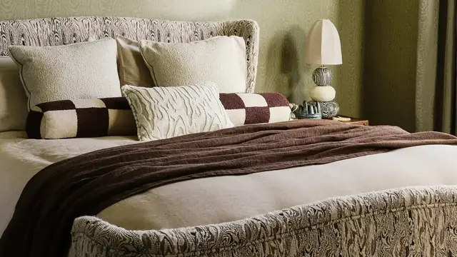 Harlequin fabrics by Henry Holland used in a coordinated bedroom