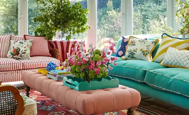 Harlequin fabrics used across sofas, cushions and upholstered furnishings