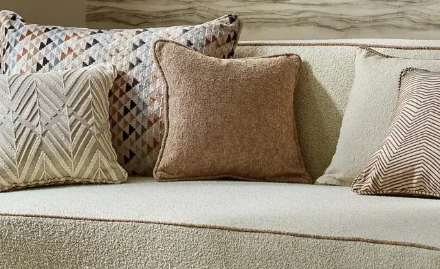 Harlequin performance and upholstery fabrics used on a sofa and cushions