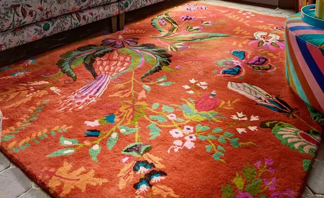 Colourful Harlequin floral rug within a coordinated living room