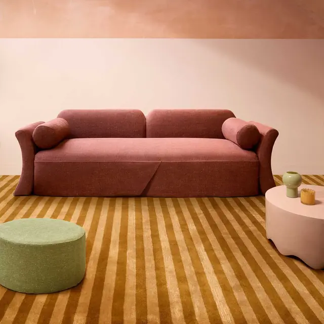 Kirkby Design Hampstead upholstery fabric on a contemporary curved sofa