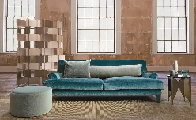 Teal sofa upholstered in Kirkby Design Rest mohair pile fabric