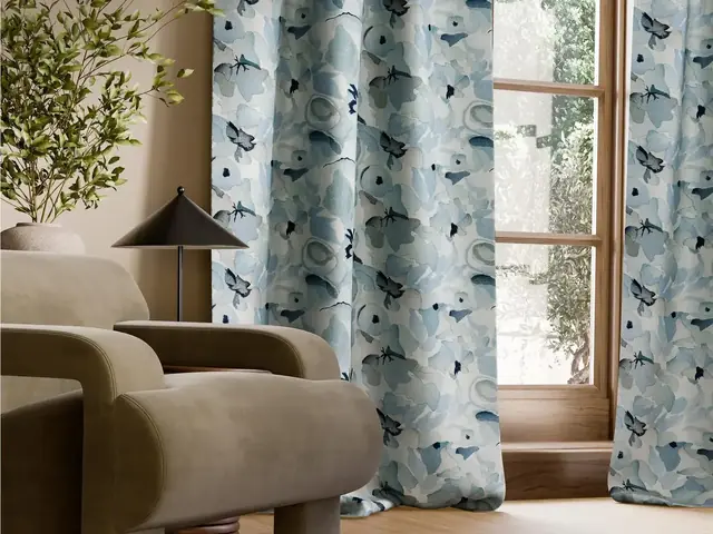Harlequin Signature floral fabric made into full-length curtains