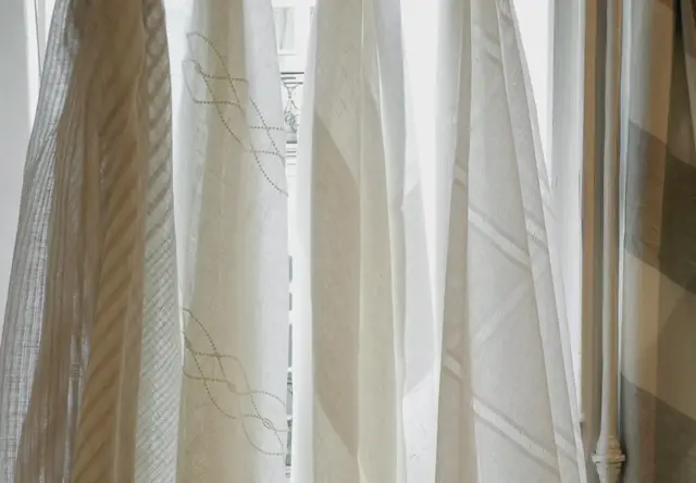 Neutral linen sheer fabric samples with coloured woven stripes