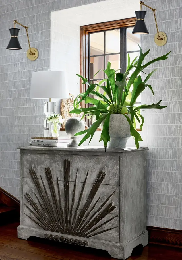 Grey Tetons linen wallpaper in a contemporary console-table setting