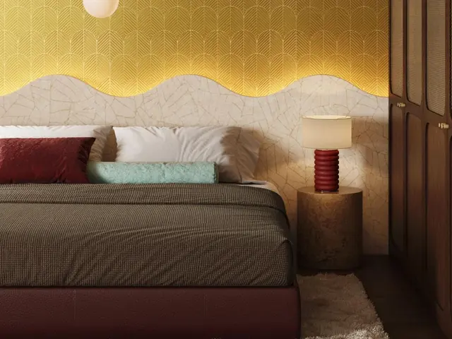 Gold sculptural wallcovering in a luxury bedroom