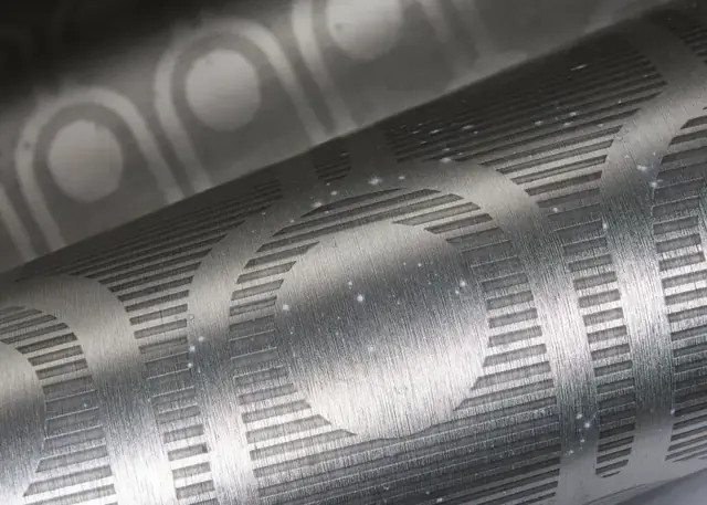 Close-up of layered metallic foil wallpaper with an arched geometric design