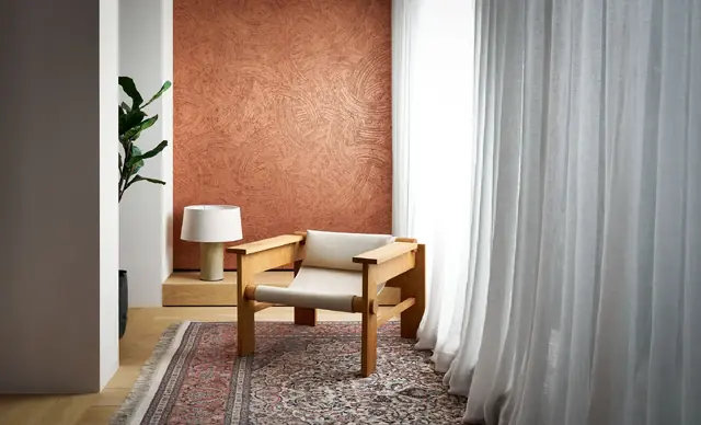 Copper metallic foil wallpaper with a textured painted effect in a contemporary interior