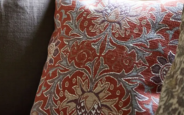 Cushion made in richly patterned Morris and Co fabric