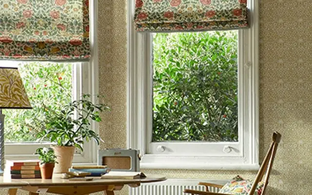 Roman blinds made in Morris and Co patterned fabric