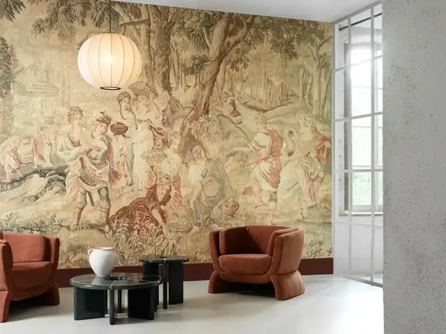 Muted multicoloured tapestry-style wallpaper in a sophisticated dining room