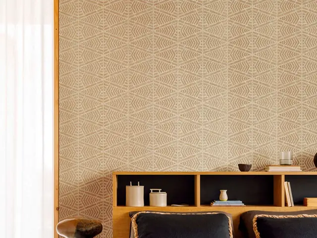 Natural woven wallcovering in a calm contemporary bedroom