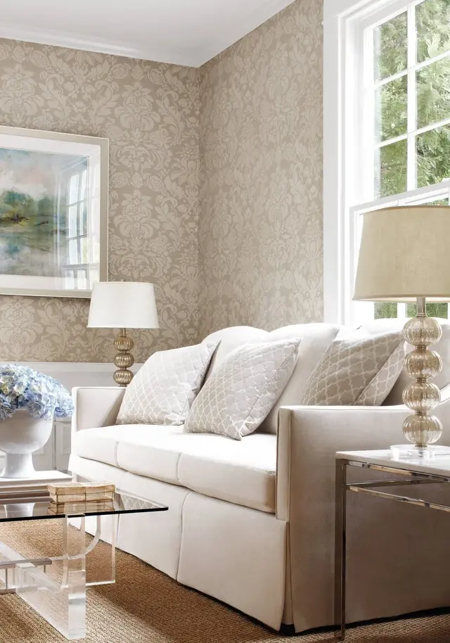 Neutral Thibaut Lyndon damask wallpaper in a calm living room