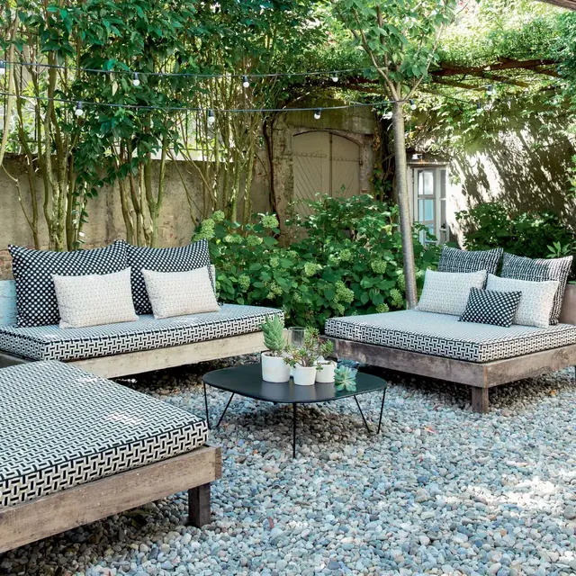Patterned outdoor contract upholstery on hospitality lounge seating