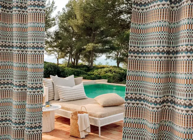 Outdoor cushion fabrics used beside a pool and terrace