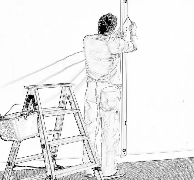 Marking a vertical guideline before hanging paste-the-wall wallpaper