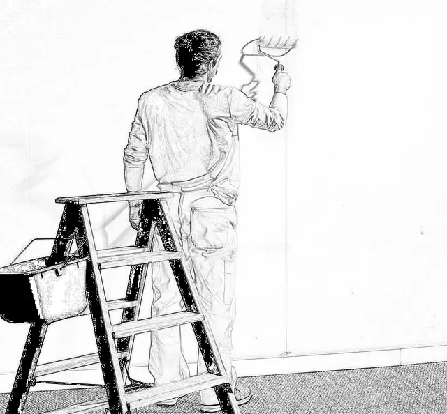 Applying wallpaper adhesive directly to the wall with a roller