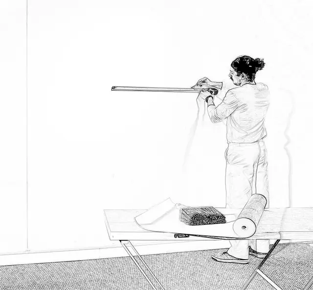 Marking a vertical guideline before hanging paste-the-paper wallpaper