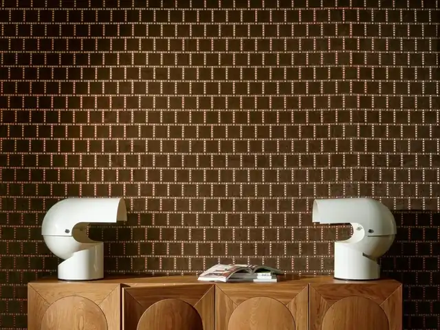 Chocolate brown geometric wallpaper with a structured metallic grid