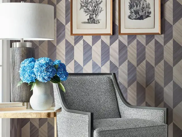 Contemporary geometric patterned wallpaper in a furnished interior