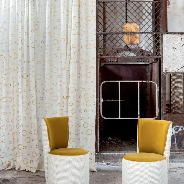 Patterned linen sheer curtains displayed in a contemporary interior