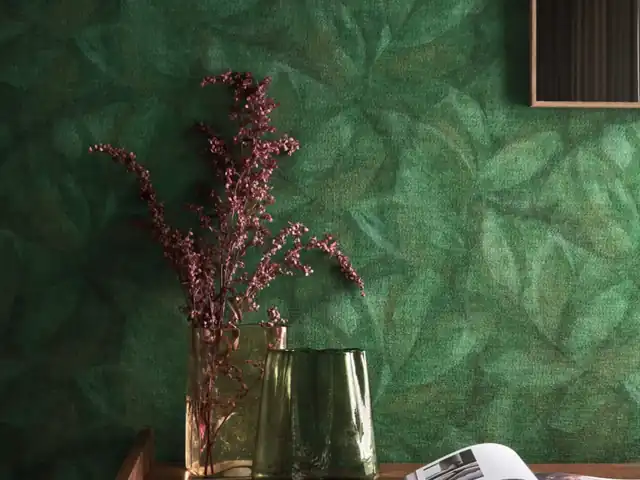 Deep green patterned paperweave wallcovering in a contemporary interior