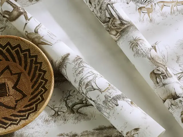 Close-up of patterned wallpaper rolls showing print, colour and surface detail