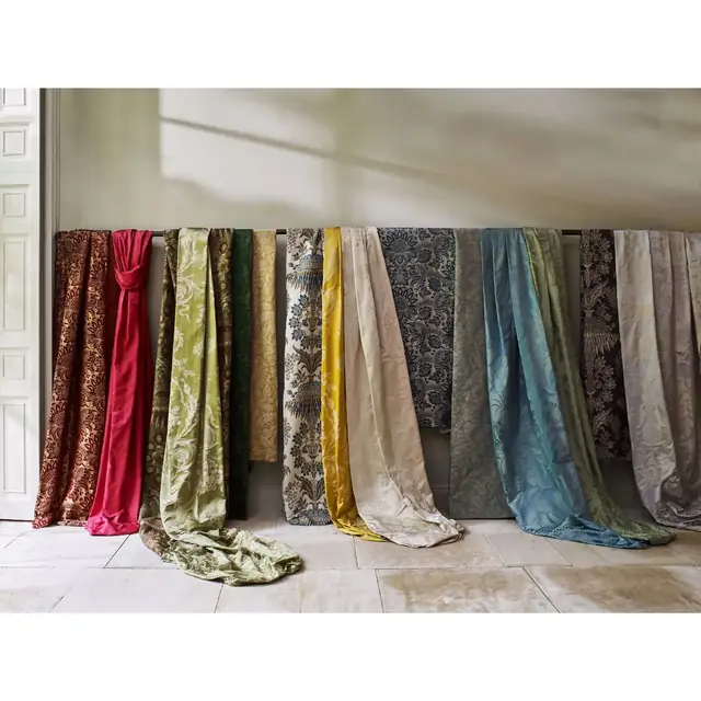 Selection of colourful plain and patterned silk furnishing fabrics