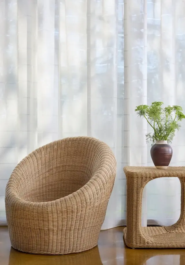 Striped wide-width sheer curtains in a light contemporary interior