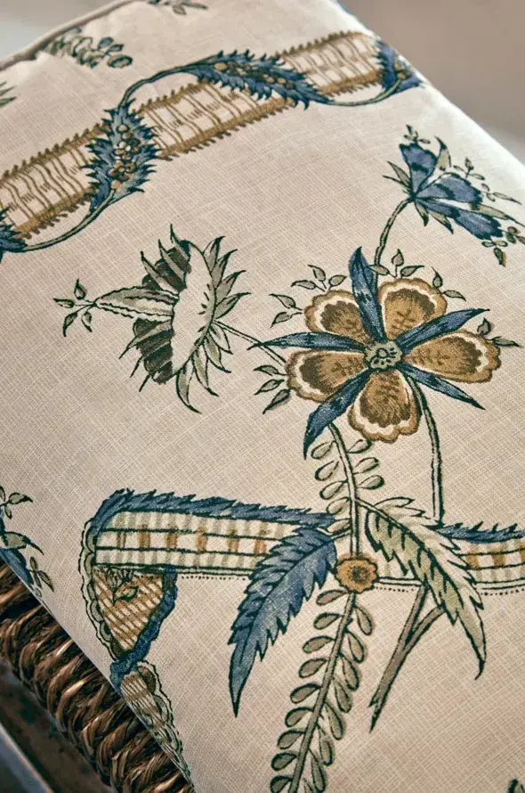 Detailed botanical print on a natural cotton fabric ground