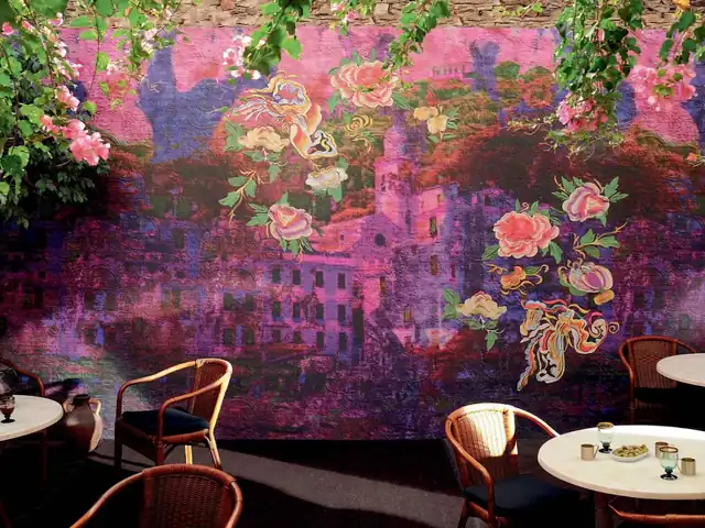 Large-scale purple panoramic wallpaper with landscape and floral detail