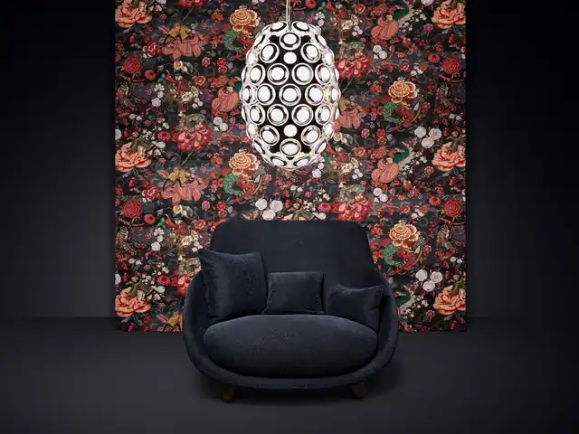 Dark floral wallpaper with red blossoms in a contemporary interior