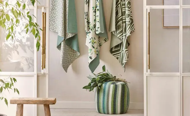 Romo patterned and textured fabrics displayed together in a bright design setting