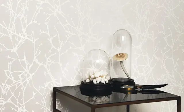 Pale Romo Arbor Beads wallpaper with a branching glass bead pattern in an elegant interior