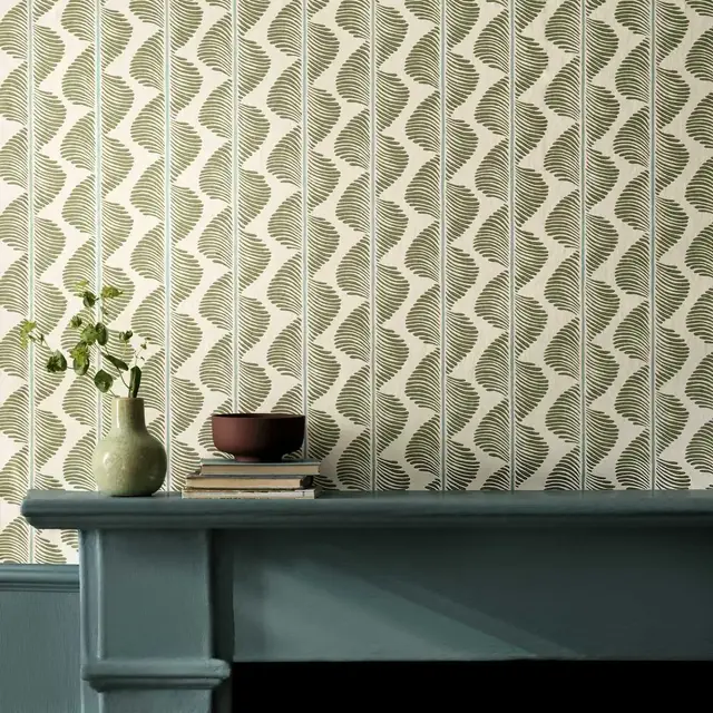 Sage green geometric Romo Aubin wallpaper in a contemporary interior