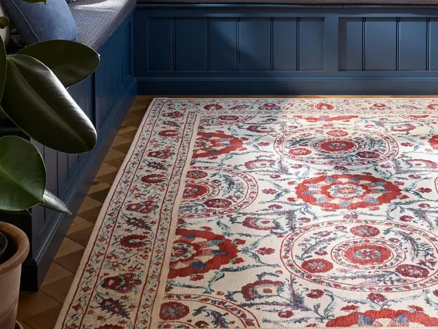 Sanderson Anthos rug in a blue seating area