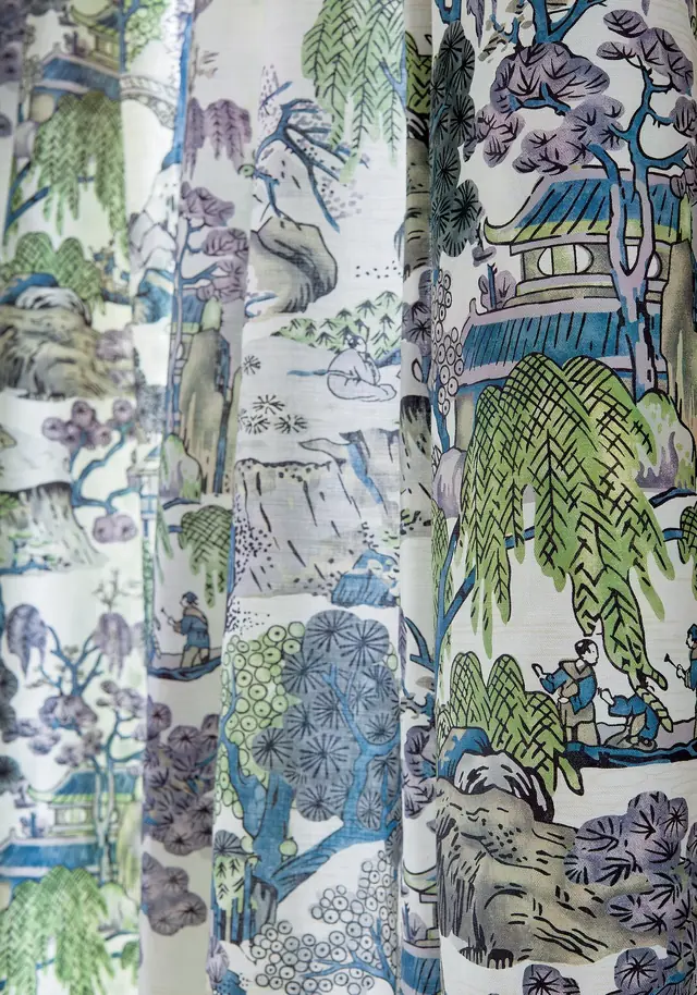 Close-up of scenic Toile de Jouy fabric with figures and landscape details