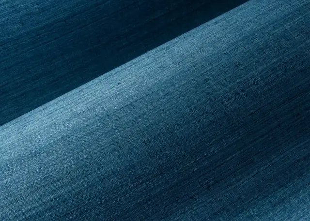 Close-up of deep blue hand-woven wild silk wallpaper