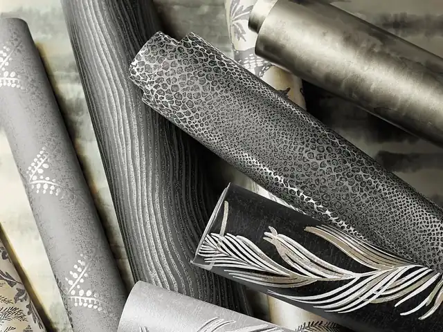 Selection of silver wallcoverings showing differences in texture and reflection