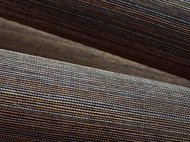 Close-up of Thibaut Windward Sisal showing the woven fibres and natural colour variation